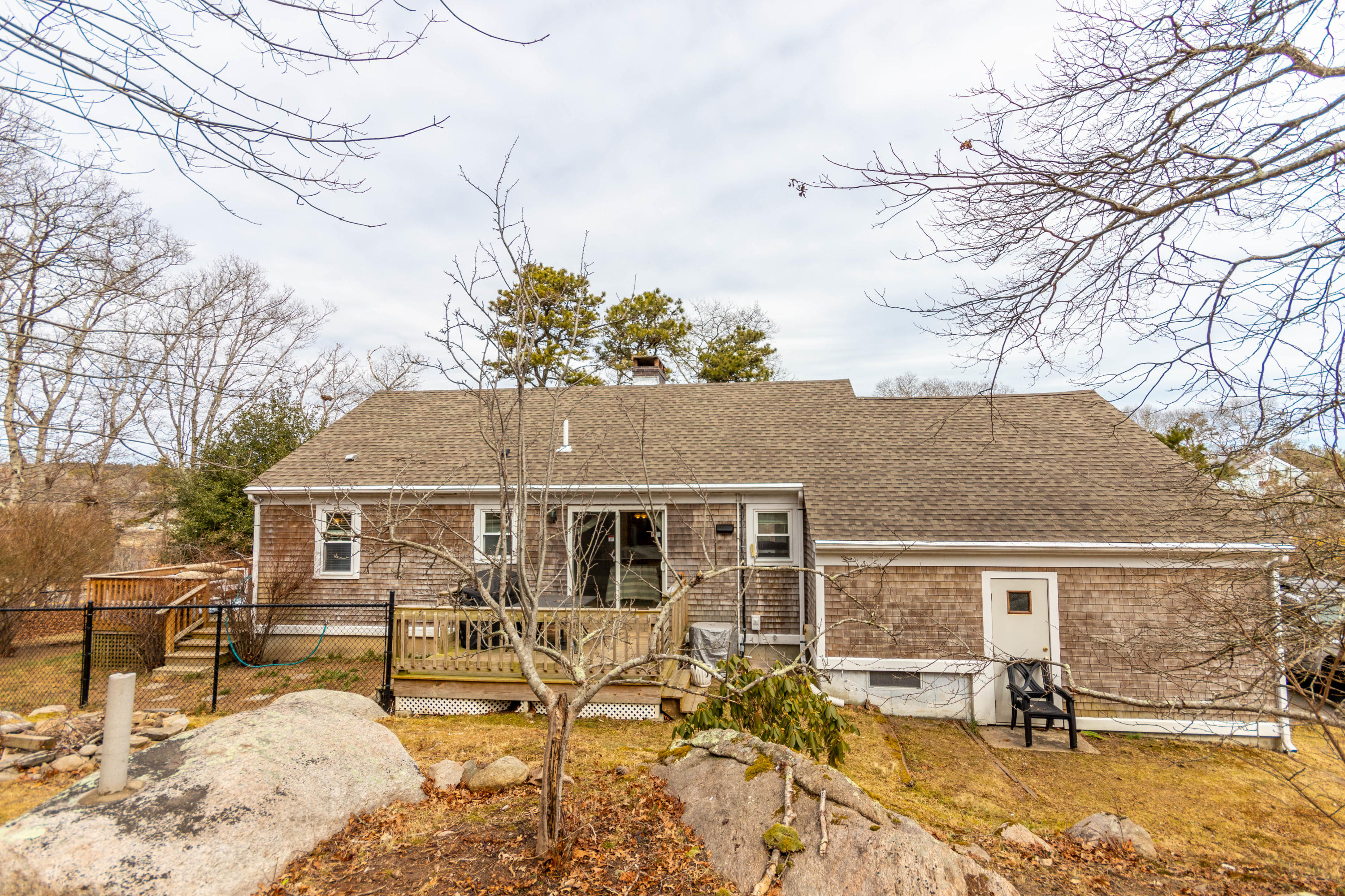 2 Long Boat Road Bourne, MA 02532 - Photo 27 of 30 front view of house with a yard