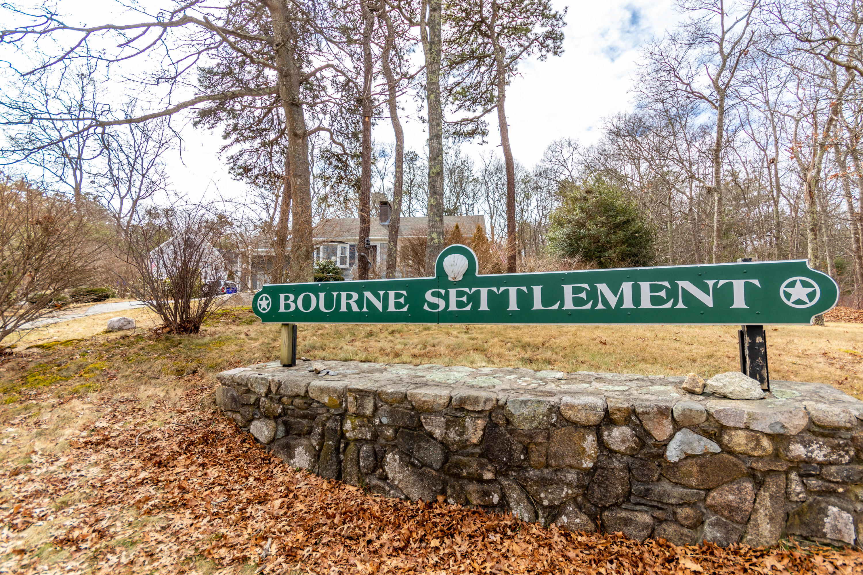 2 Long Boat Road Bourne, MA 02532 - Photo 29 of 30 a view of outdoor space with signage and flags
