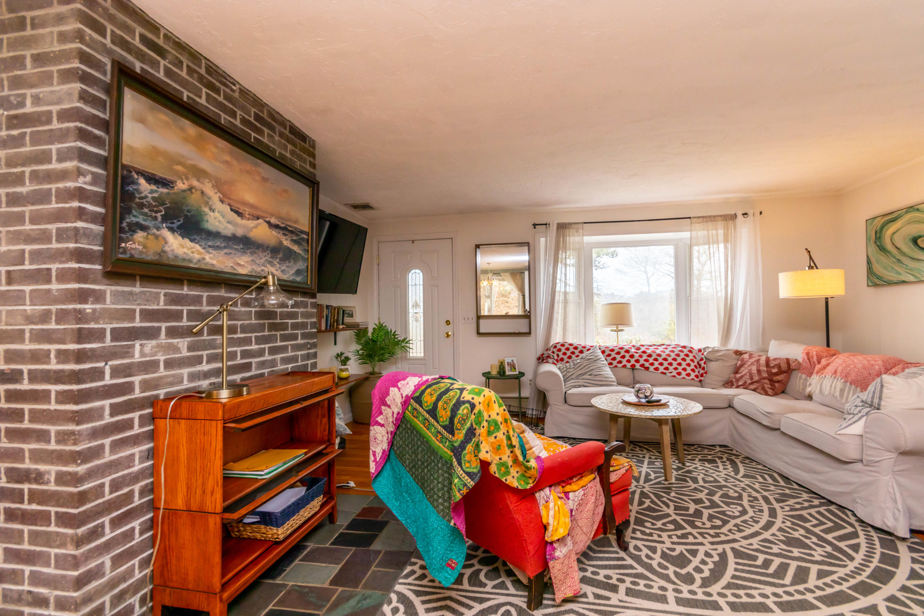 2 Long Boat Road Bourne, MA 02532 - Photo 6 of 30 a living room with furniture a rug and a window
