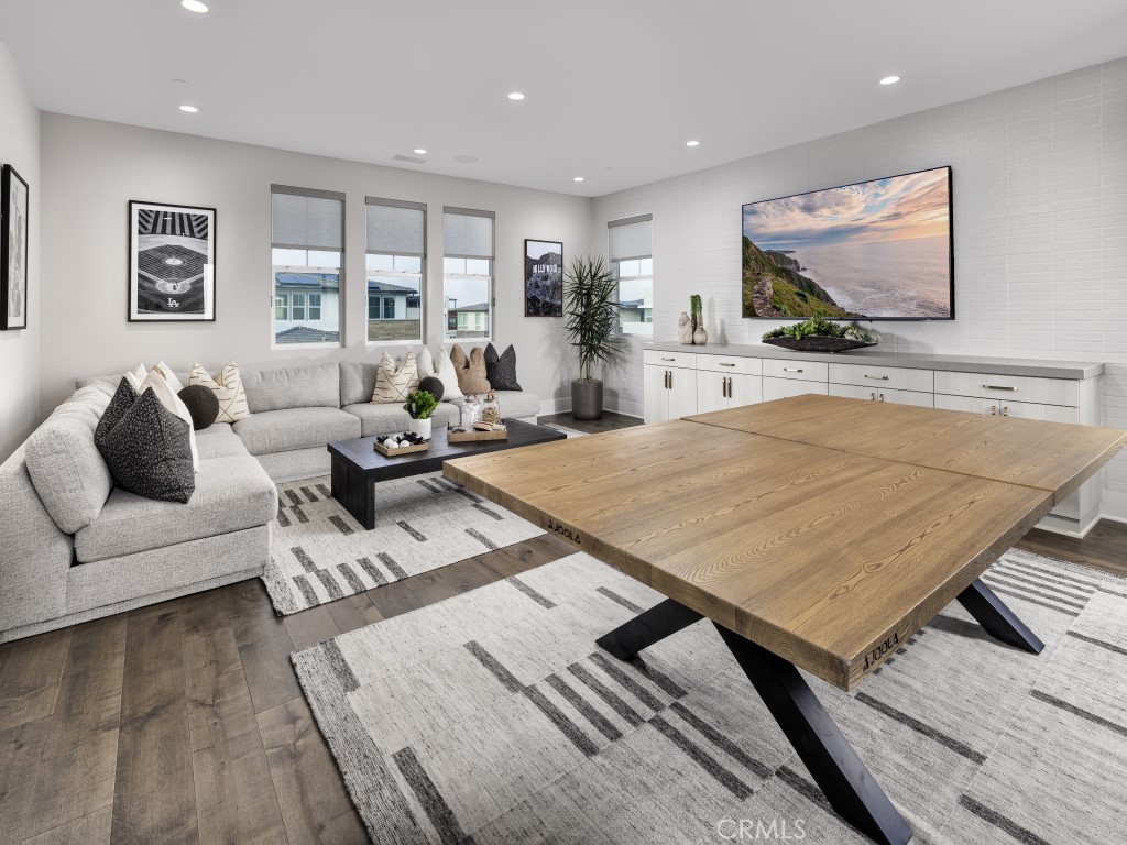 25 Remy Lane Montebello, CA 90640 - Photo 11 of 49 a living room with furniture and a flat screen tv
