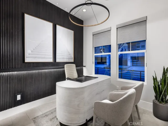 a living room with furniture and window