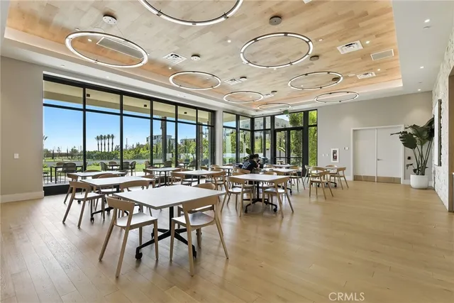 an open kitchen with a table and chairs