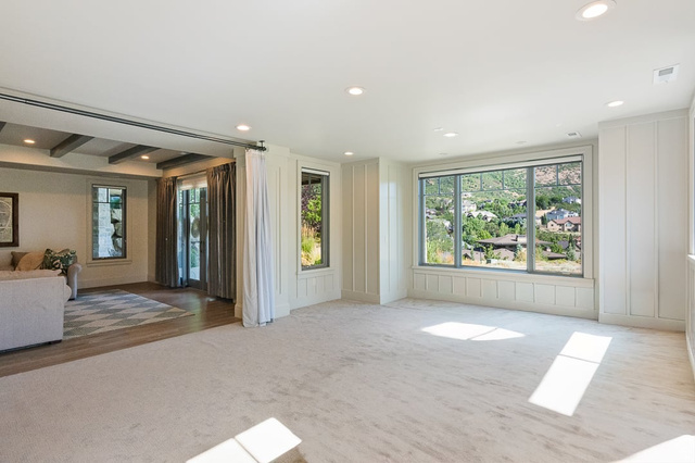 3 Carriagewood Cove, Unit 1088 Sandy, UT 84092 - Photo 55 of 79 Spacious room featuring broadloom carpeting and multiple large windows