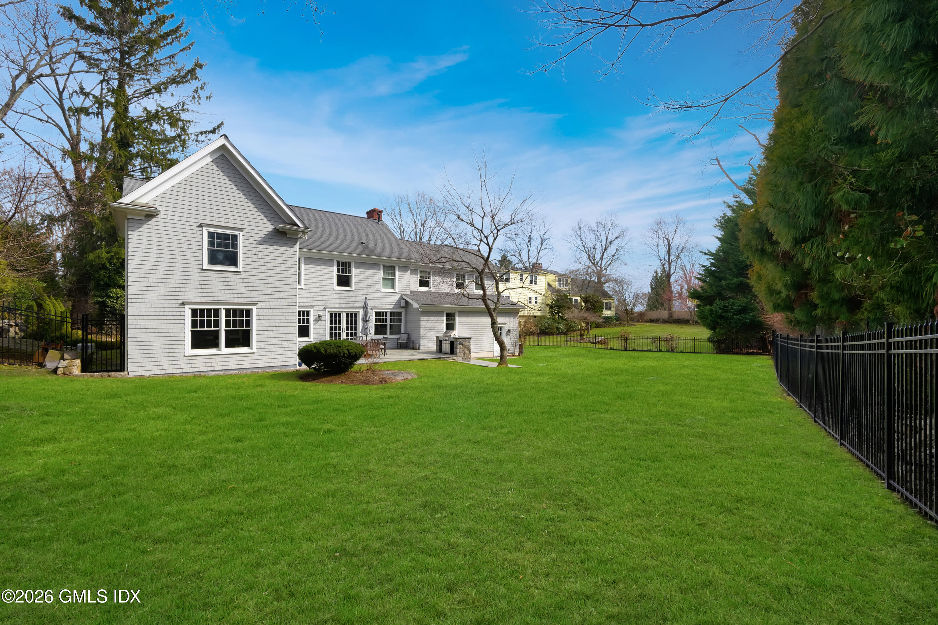 15 Pell Place Riverside, CT 06878 - Photo 29 of 35 a view of a house with backyard and garden