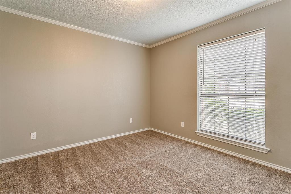 2407 Ridgevalley Drive McKinney, TX 75071 - Photo 20 of 28 a view of an empty room with a window