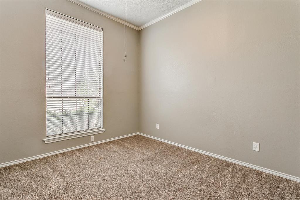 2407 Ridgevalley Drive McKinney, TX 75071 - Photo 21 of 28 an empty room with a window