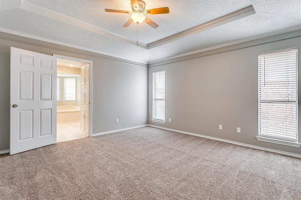 2407 Ridgevalley Drive McKinney, TX 75071 - Photo 23 of 28 a view of an empty room with a window