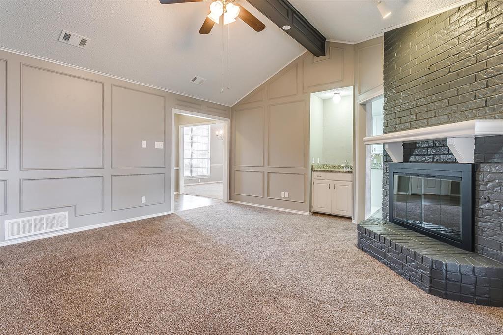 2407 Ridgevalley Drive McKinney, TX 75071 - Photo 9 of 28 a view of empty room with cabinet and fan