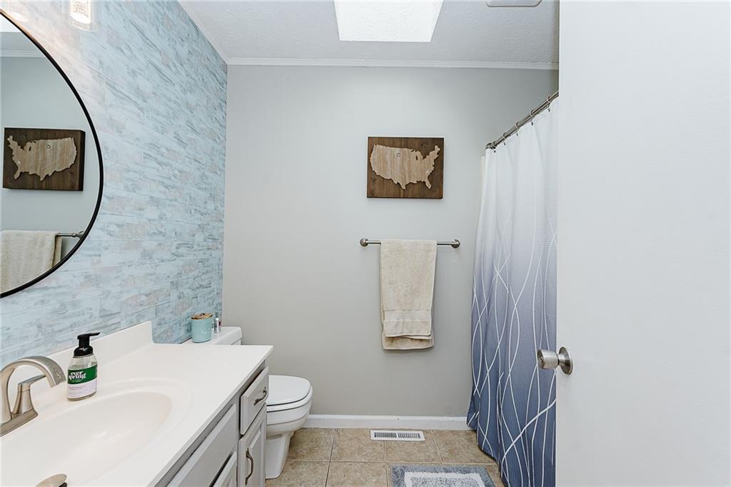 979 Barclay Road Indiana, PA 15701 - Photo 18 of 37 a bathroom with a sink and a mirror