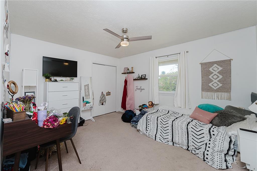 979 Barclay Road Indiana, PA 15701 - Photo 22 of 37 a living room with furniture and a flat screen tv