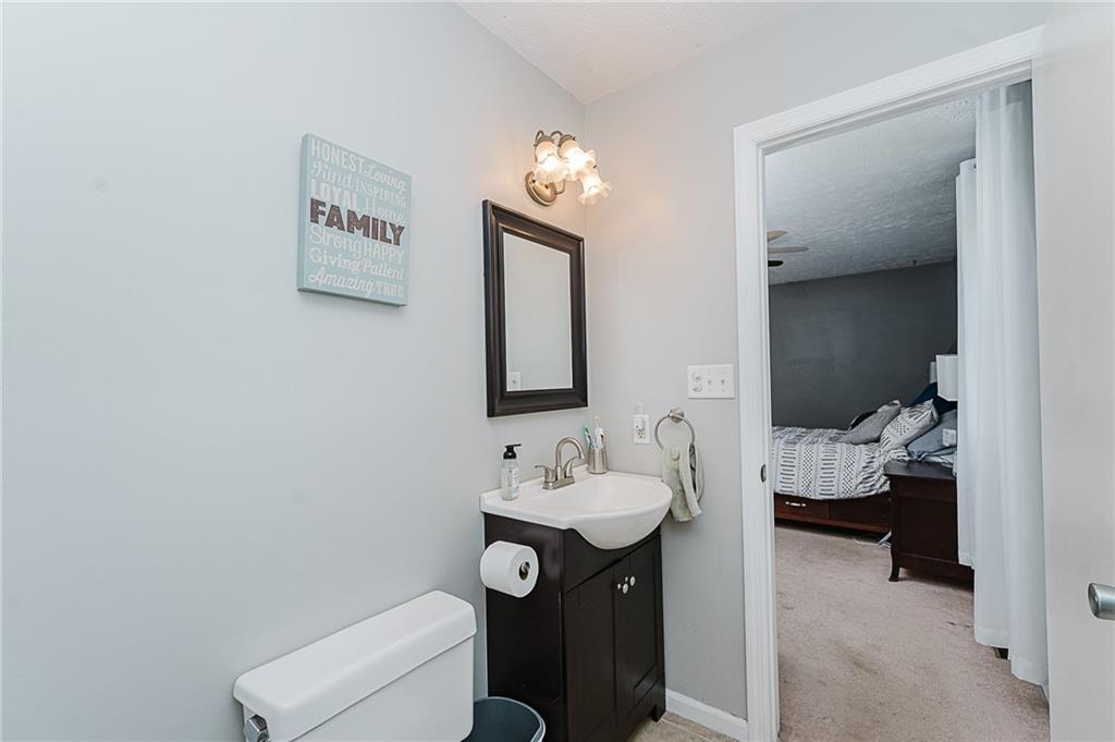 979 Barclay Road Indiana, PA 15701 - Photo 24 of 37 a bathroom with a toilet sink and mirror