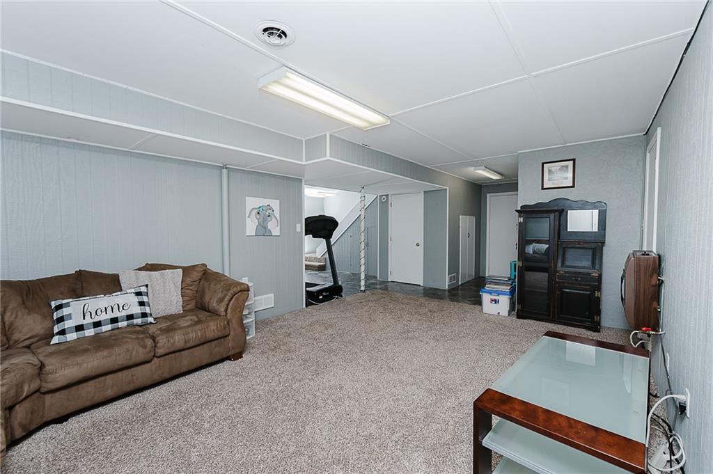 979 Barclay Road Indiana, PA 15701 - Photo 29 of 37 a living room with furniture and a flat screen tv