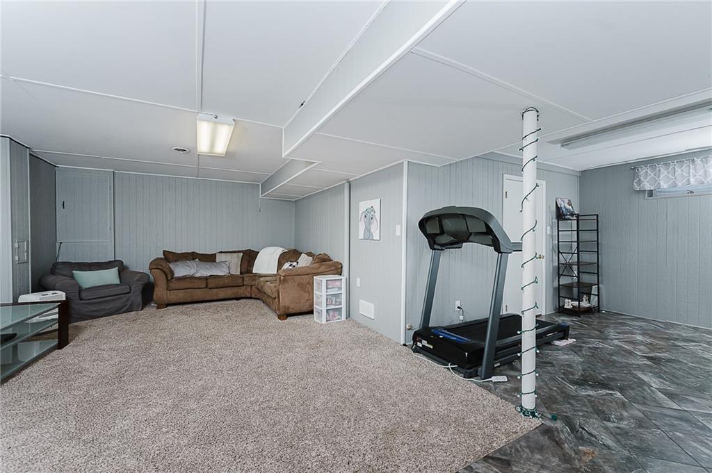 979 Barclay Road Indiana, PA 15701 - Photo 30 of 37 a view of a livingroom with furniture and a gym equipment