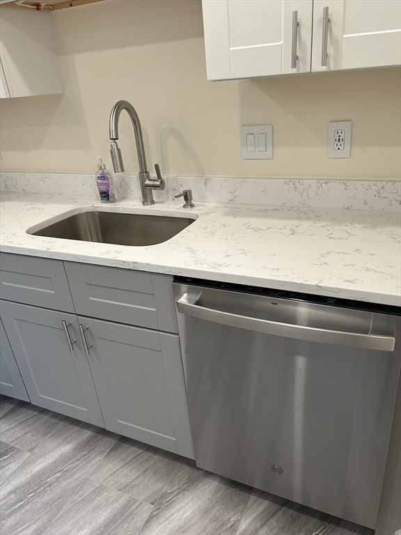 50 Main Street, Unit 409 Watertown, MA 02472 - Photo 4 of 9 a close view of sink and tap