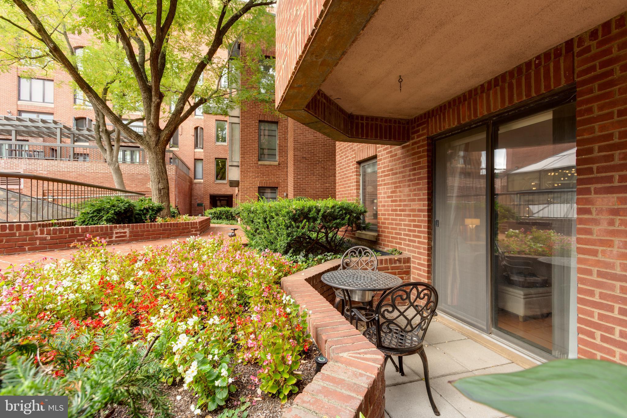 1080 Wisconsin Avenue Northwest, Unit 1011 Washington, DC 20007 - Photo 16 of 30 Master bedroom private patio