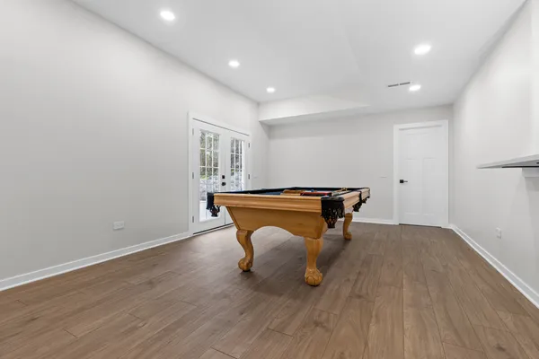 a room with furniture and wooden floor