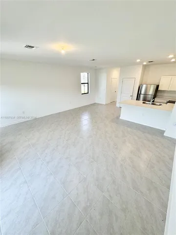 a view of a livingroom with a sink