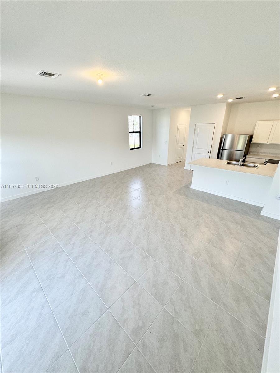 891 Northwest 3rd Street, Unit 891 Pompano Beach, FL 33060 - Photo 13 of 33 a view of a livingroom with a sink