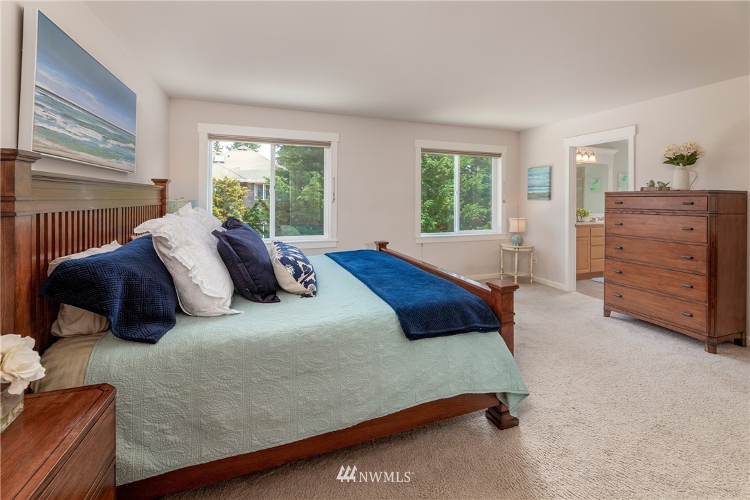 22421 6th Place West Bothell, WA 98021 - Photo 22 of 40 a bedroom with a bed and a dresser