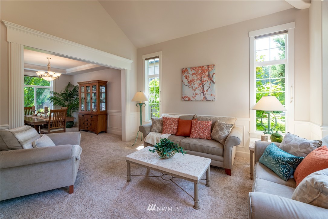 22421 6th Place West Bothell, WA 98021 - Photo 4 of 40 a living room with furniture and a large window
