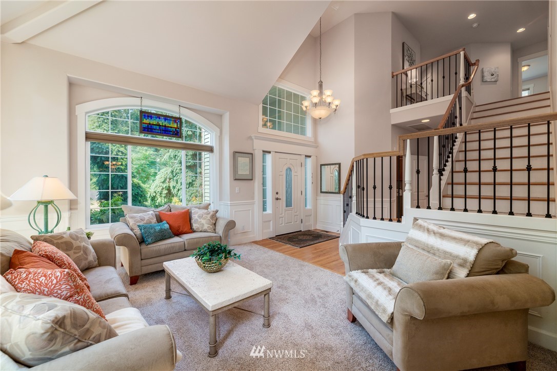22421 6th Place West Bothell, WA 98021 - Photo 5 of 40 a living room with furniture and a large window