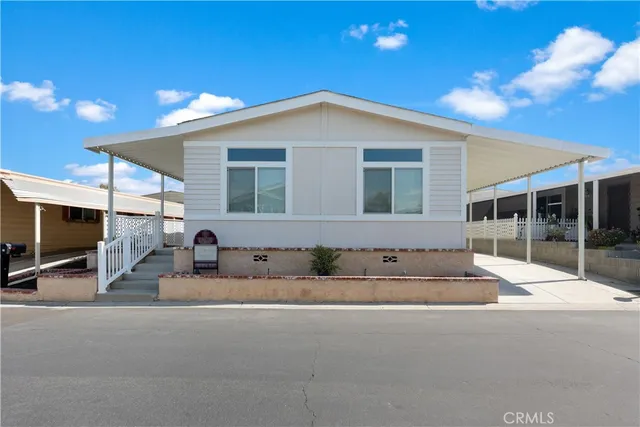 a view of a house with a street
