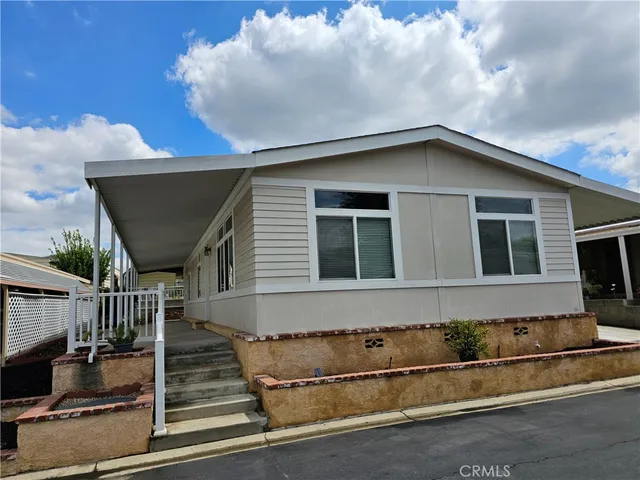 a front view of a house with a garage
