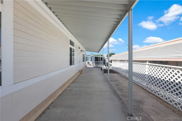 a view of a house with wooden stairs