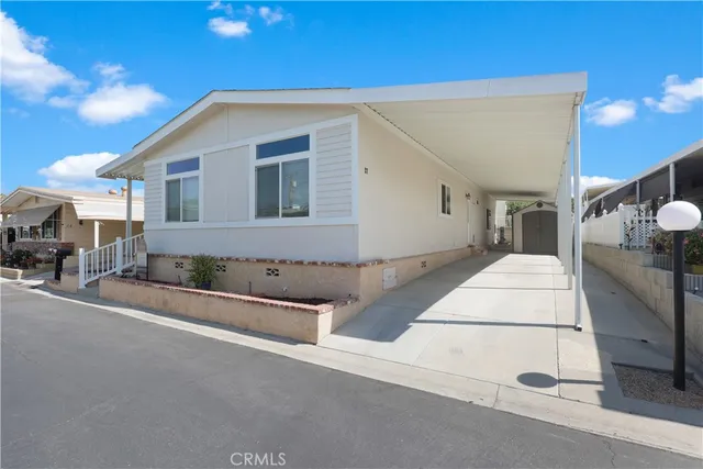 a view of a house with a street