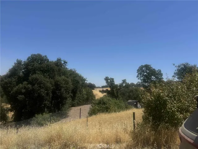 a view of a lake and a yard