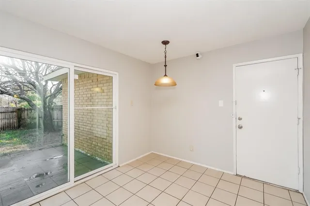 en empty room with windows