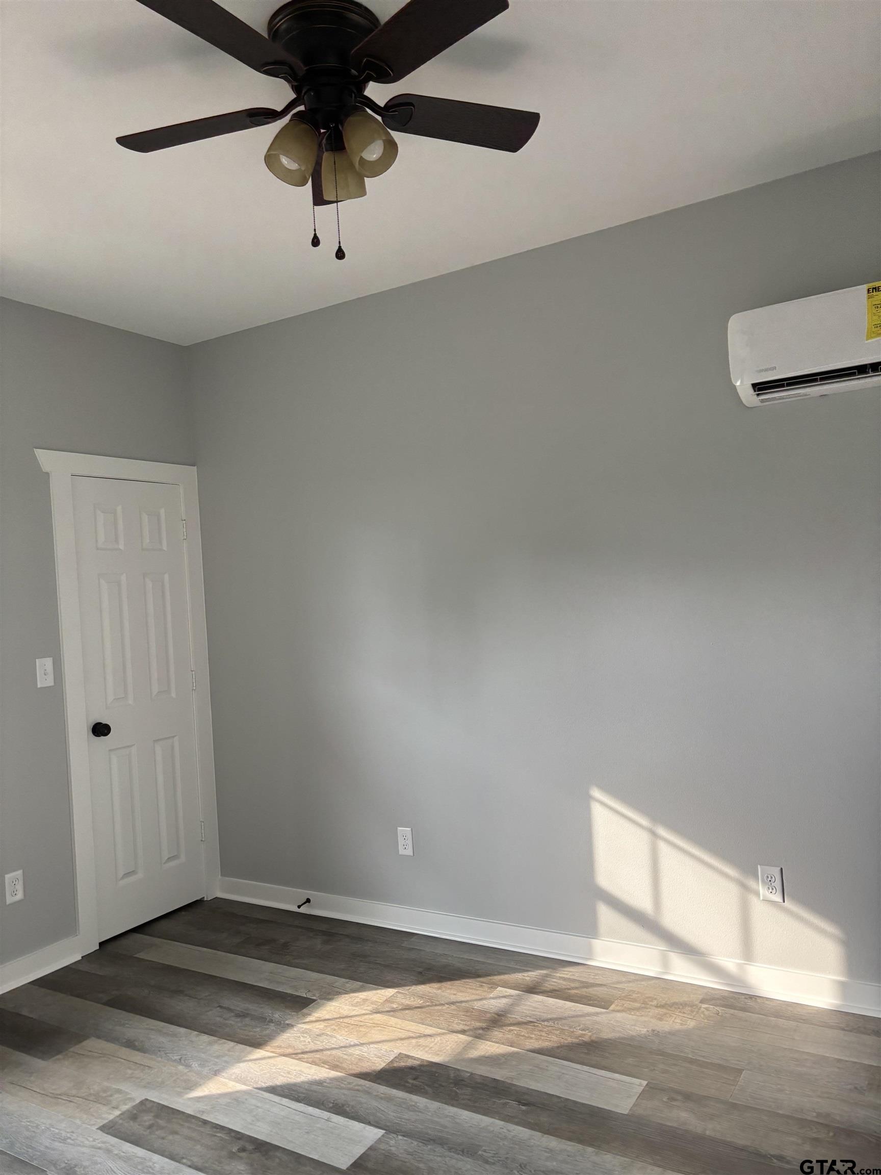 11571 19th Avenue, Unit 103 Tyler, TX 75708 - Photo 2 of 4 a view of an empty room