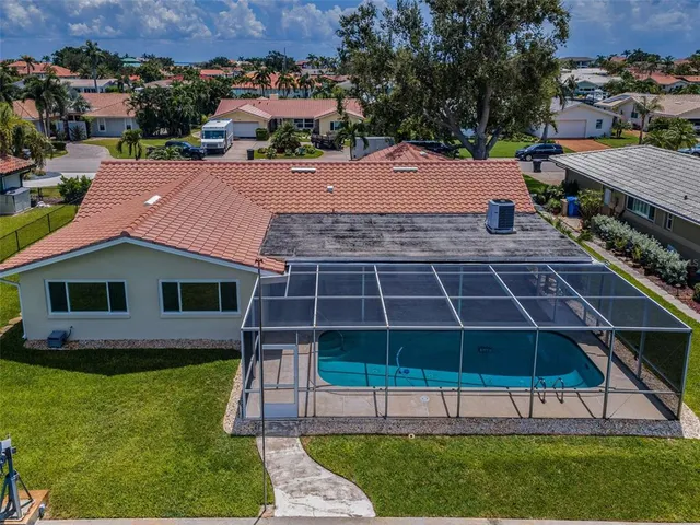 a view of a backyard with a garden and plants