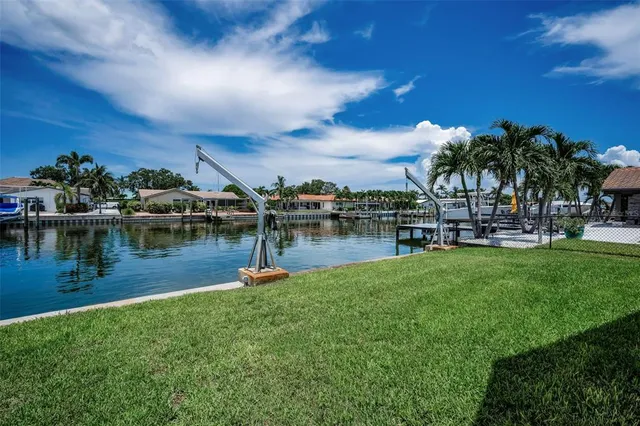 a view of a swimming pool with a garden