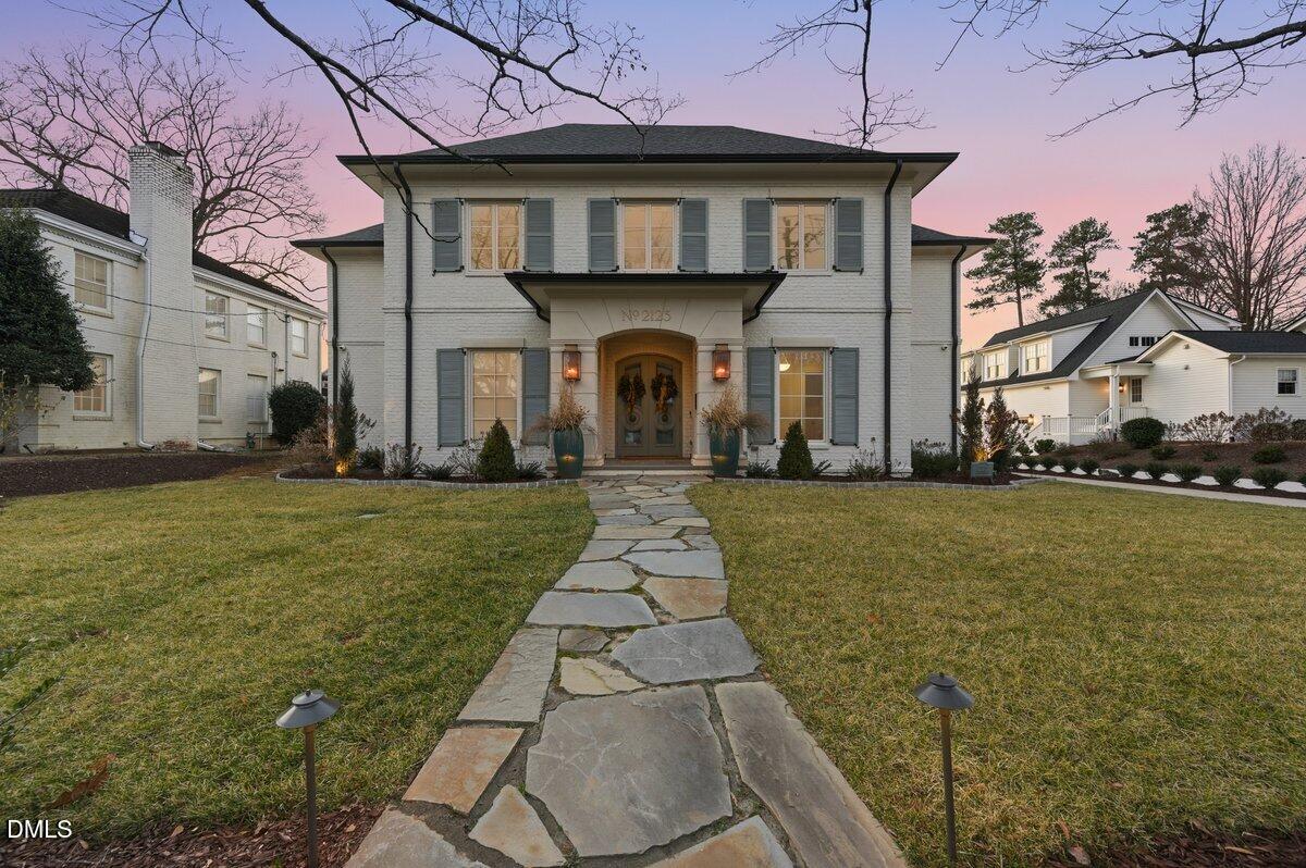 2123 St Marys Street Raleigh, NC 27608 - Photo 71 of 77 a front view of a house with a yard