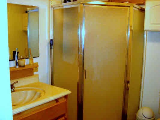 5100 Alii Road Hanapepe, HI 96716 - Photo 16 of 16 a bathroom with a sink and mirror