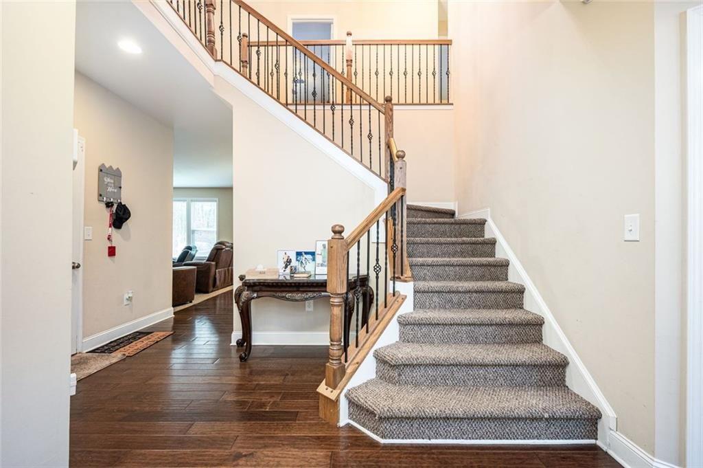 2020 Youngstown Place Powder Springs, GA 30127 - Photo 4 of 25 a view of entryway and hall with wooden floor