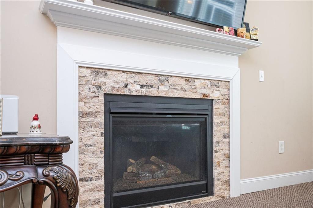 2020 Youngstown Place Powder Springs, GA 30127 - Photo 10 of 25 a view of fireplace and utility room