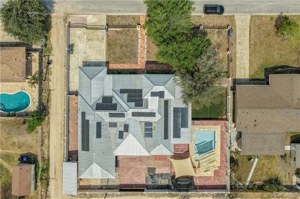 aerial view of a house with a garden