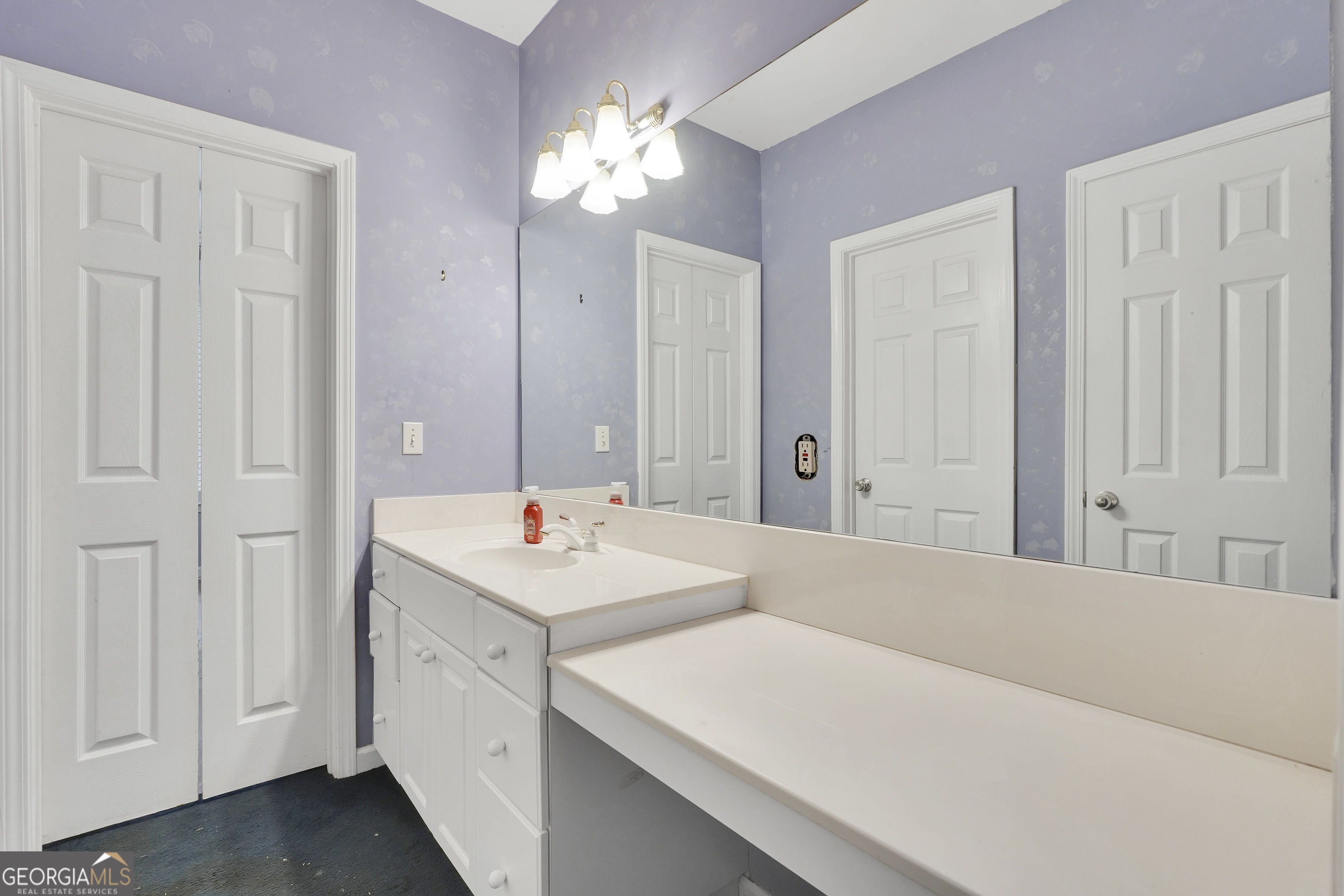 3003 Southwest East Fairview Road McDonough, GA 30252 - Photo 28 of 48 a spacious bathroom with a double vanity sink mirror and