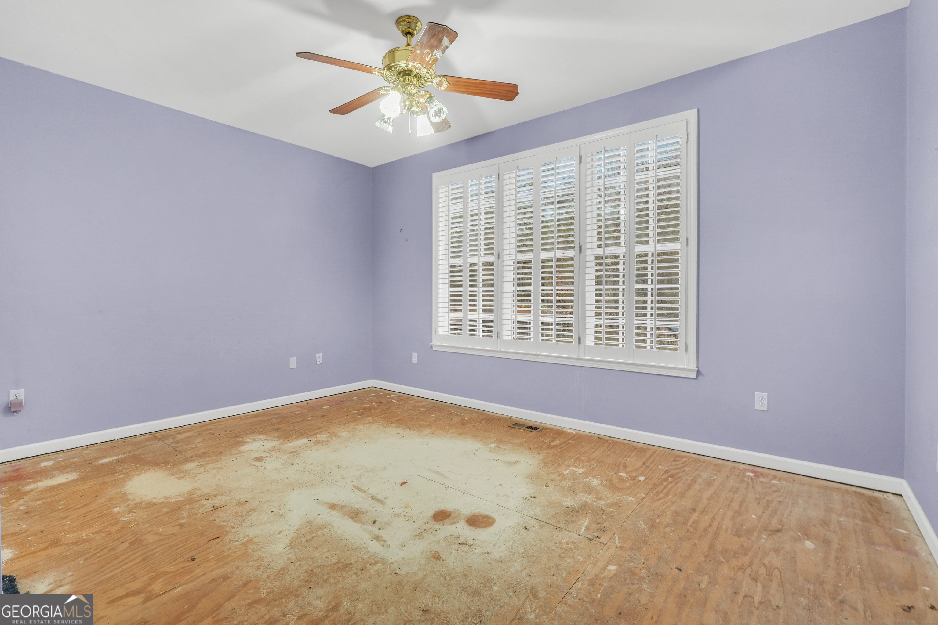 3003 Southwest East Fairview Road McDonough, GA 30252 - Photo 29 of 48 an empty room with a window