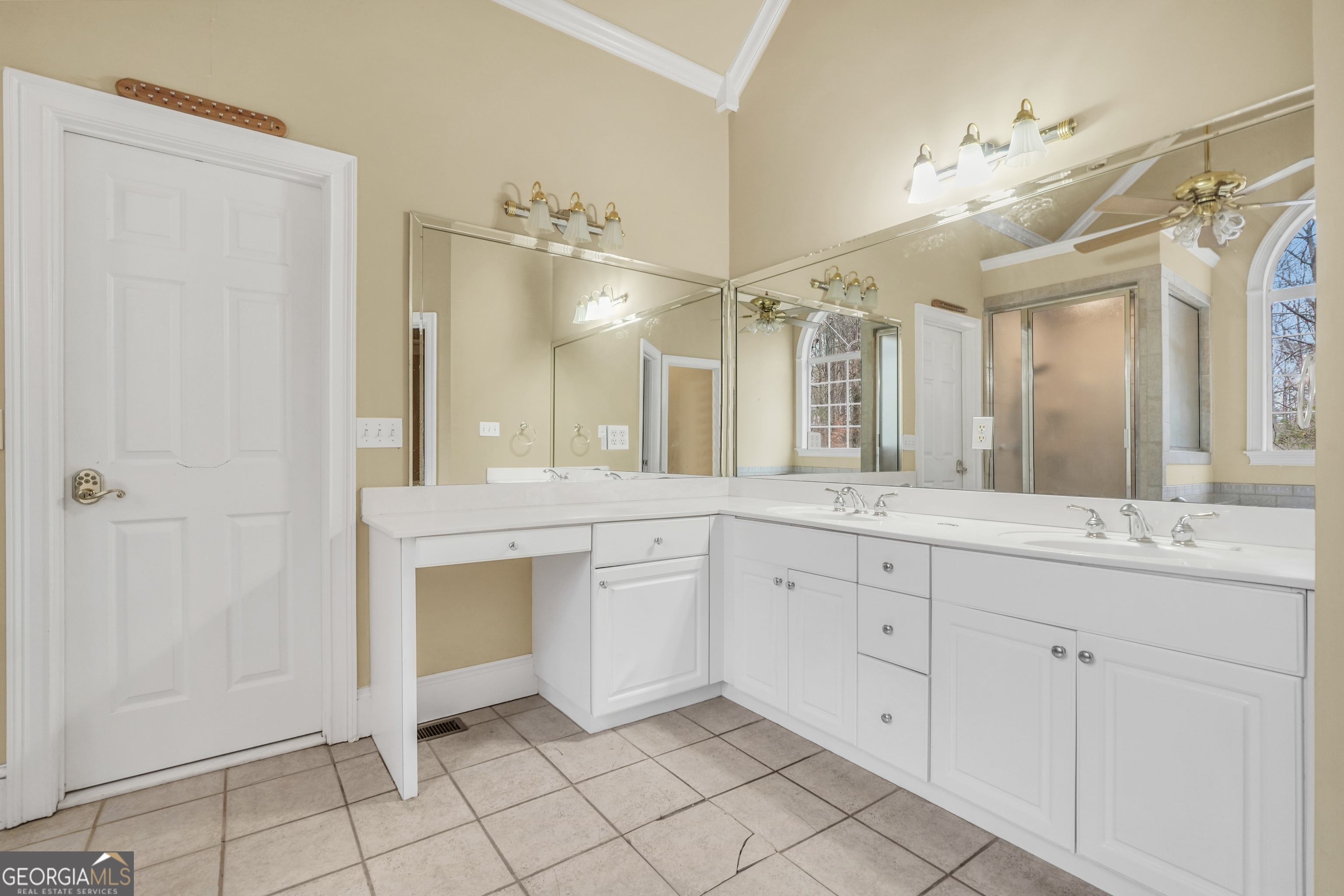 3003 Southwest East Fairview Road McDonough, GA 30252 - Photo 35 of 48 a spacious bathroom with a granite countertop sink mirror and