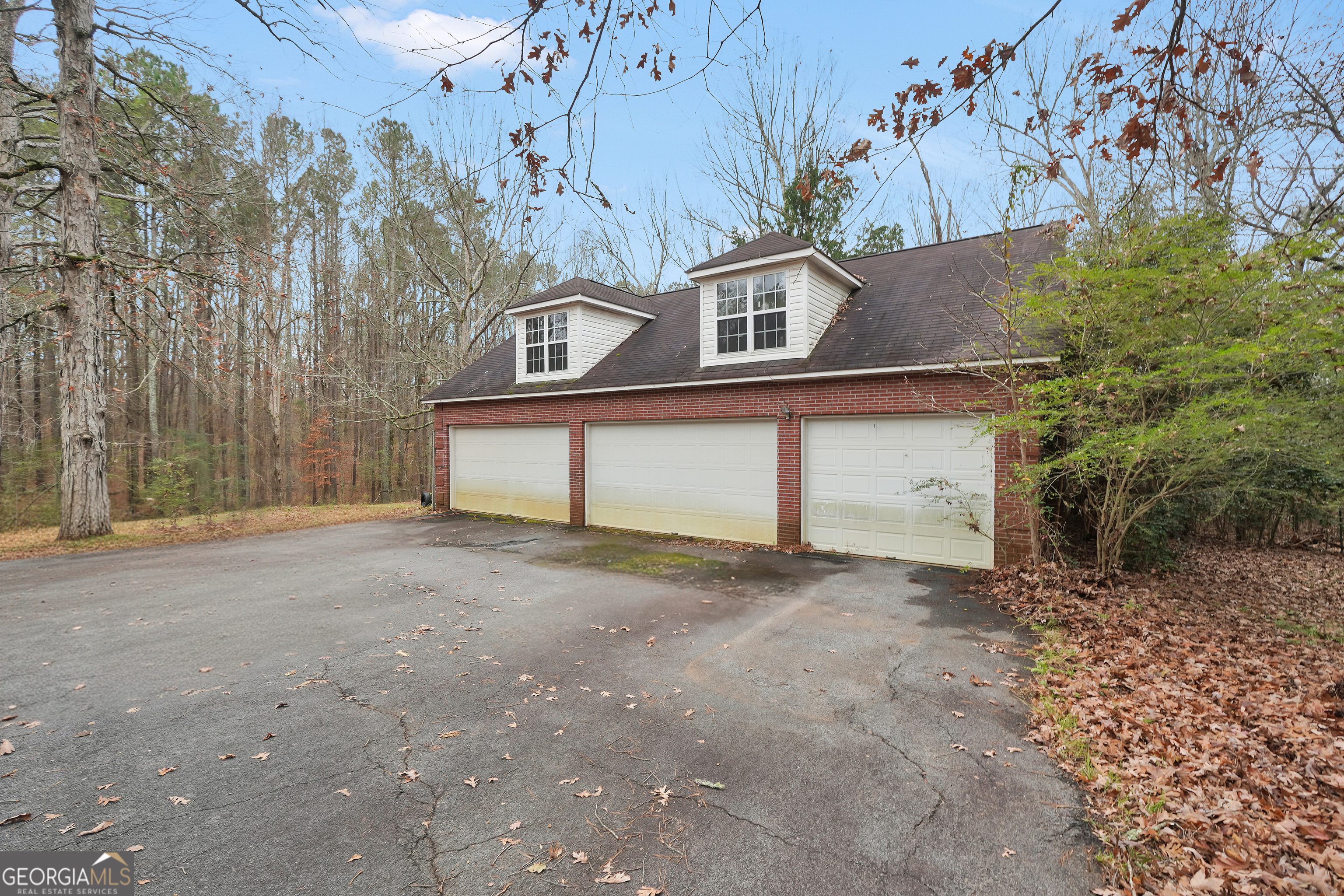3003 Southwest East Fairview Road McDonough, GA 30252 - Photo 43 of 48 a view of house with a tree in front of it