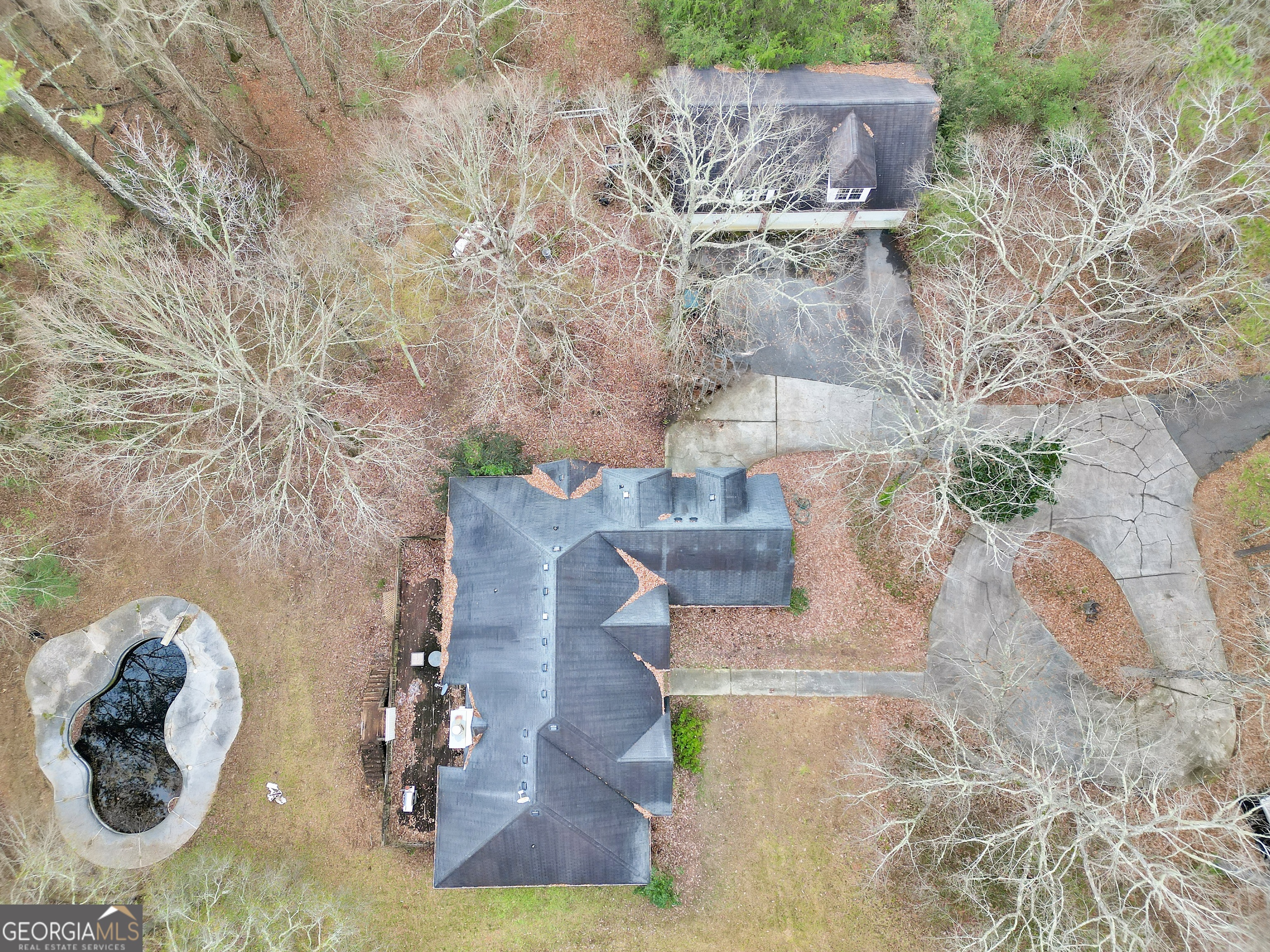 3003 Southwest East Fairview Road McDonough, GA 30252 - Photo 6 of 48 an aerial view of a house with outdoor space