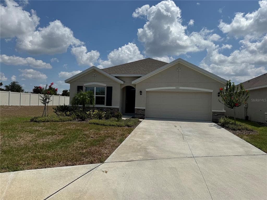 5105 Sultana Cove Bradenton, FL 34211 - Photo 1 of 23 a front view of a house with garden