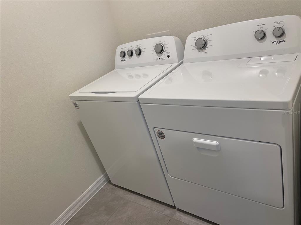 5105 Sultana Cove Bradenton, FL 34211 - Photo 13 of 23 a utility room with dryer and washer