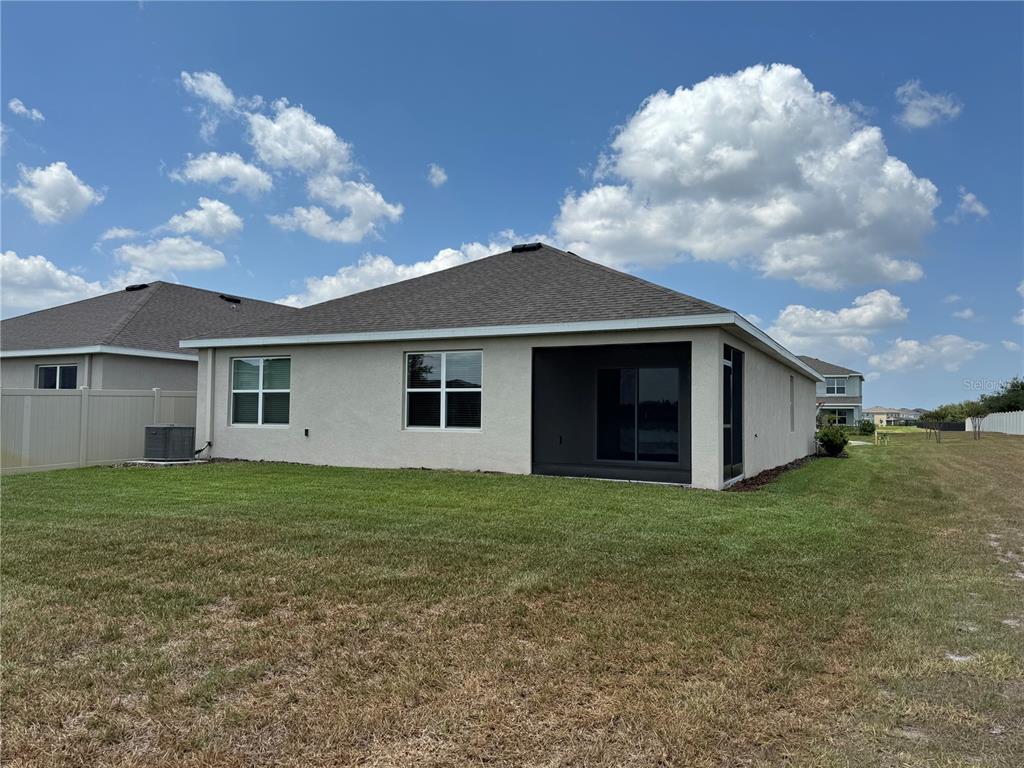 5105 Sultana Cove Bradenton, FL 34211 - Photo 5 of 23 a view of a house with backyard