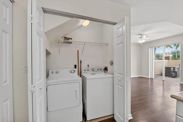 a view of hallway with washer and dryer