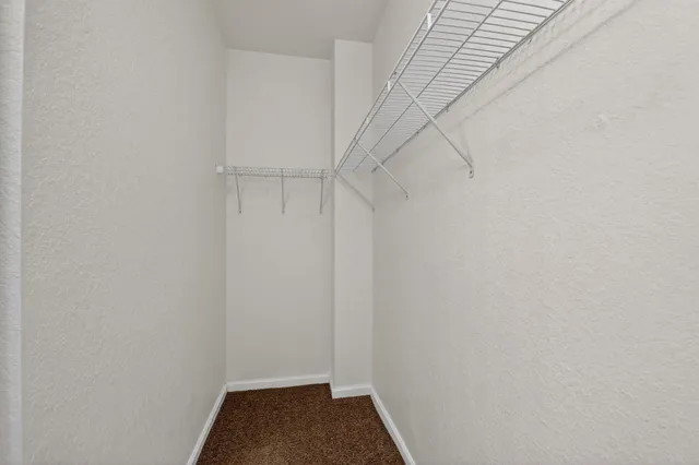 a view of small space with racks on the wall