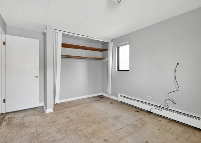 a view of a room with rack on the wall